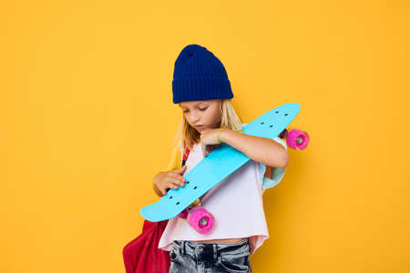 teenager with a skateboard on his head Childhood lifestyle conceptの写真素材
