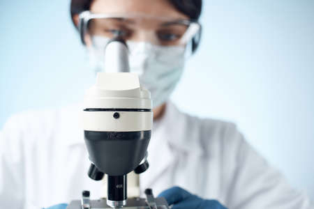 female doctor chemical solutions biologist research study close-upの写真素材