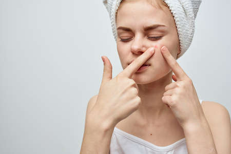 pretty woman with a towel on my head cosmetology Studioの写真素材