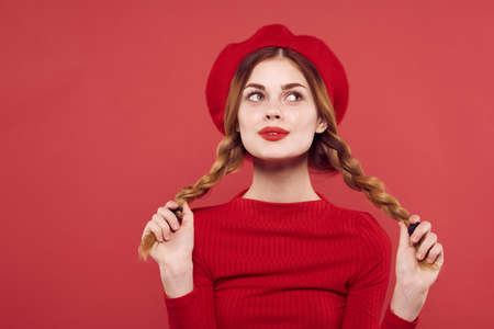 cheerful woman with pigtails fun Red lips luxury studio posingの写真素材