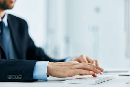 typing on the keyboard desktop Office managerの写真素材