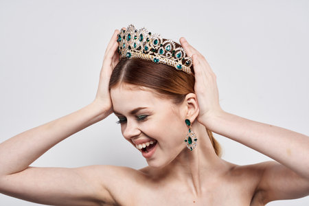 portrait of a woman with a crown on her head makeup model close-up lifestyleの写真素材