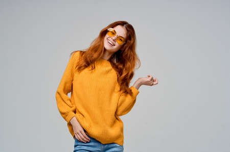 beautiful woman attractive look fashion modern style light backgroundの写真素材