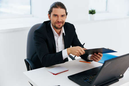 Man emotions work office desk technology