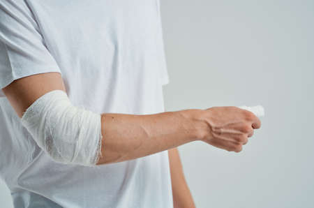male patient hand injury treatment health problems hospital medicineの写真素材
