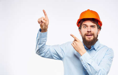 man in shirt orange helmet safety construction engineer