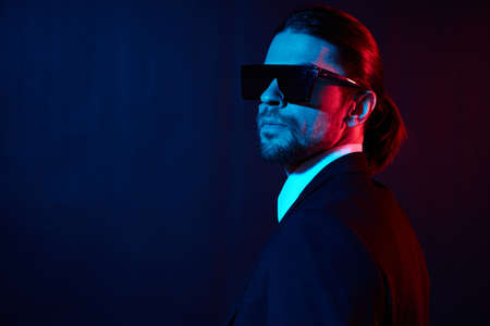 stylish man in a jacket posing self confidence sunglasses lifestyle model