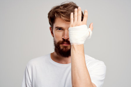 sick man hand injury treatment health problems emotions isolated backgroundの写真素材