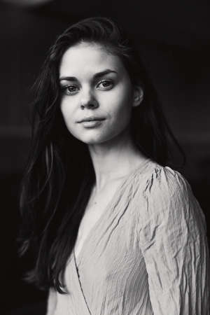 attractive woman in dress posing outdoors attractive look unalteredの写真素材