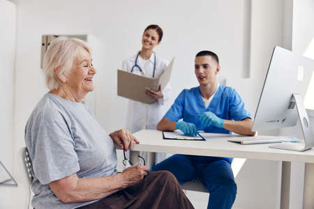 old woman hospital examination professional adviceの写真素材