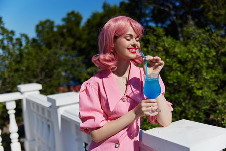 Young female happiness vacation sunny summer cocktail Happy female relaxingの写真素材