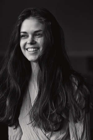 portrait of a beautiful woman in dress posing outdoors attractive look Lifestyleの写真素材