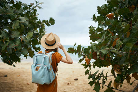 woman with backpack travel walk island fresh airの写真素材