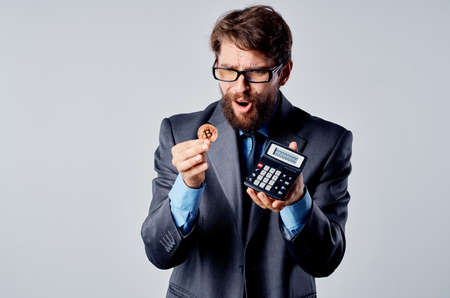 bearded man in a suit investment economy change in exchange rates studio official