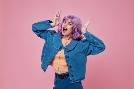 Beauty Fashion woman in denim jacket purple hair glamor makeup color background unaltered