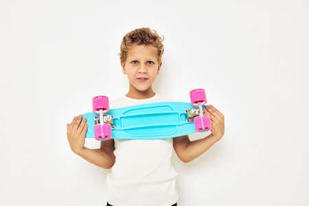 Portrait of young smiling kid active rest entertainment isolated backgroundの写真素材