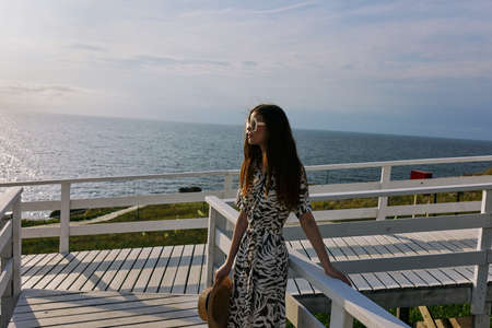 woman Walk near the hotel sea travel luxury unaltered