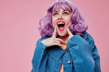 Pretty young female wavy purple hair blue jacket emotions fun pink background unaltered