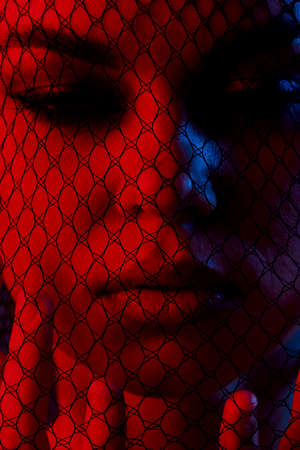 young woman posing mesh on the face neon Lifestyle unaltered