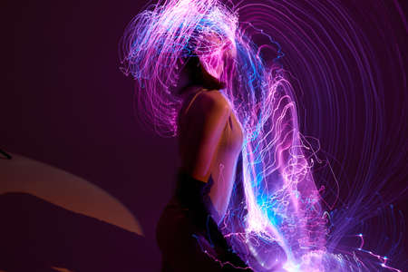 pretty woman disco neon lines luxury fashion color background unalteredの写真素材