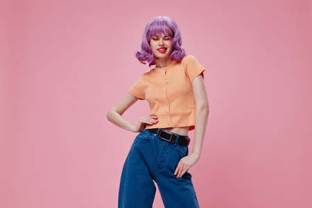 smiling woman fashion posing pink background glamorの写真素材