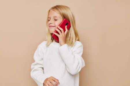 happy child talking on the phone technology kids lifestyle conceptの写真素材