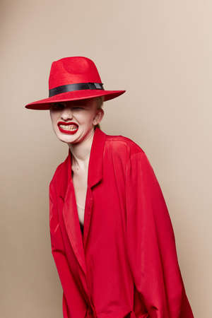woman red lips fashion jacket cosmetics studio model unalteredの写真素材