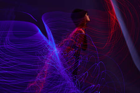 Beautiful fashionable girl neon lines light posing Lifestyle unaltered