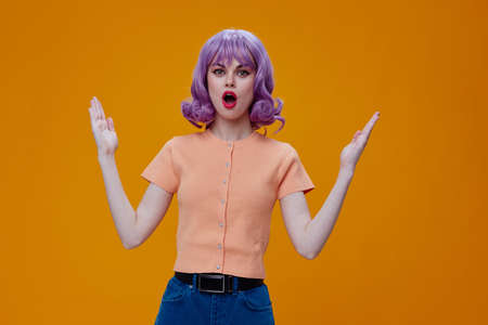 pretty woman hand gestures purple hair fashion clothes color background unaltered