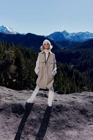 woman Cliffs mountains fashion posing nature fresh air lifestyleの写真素材