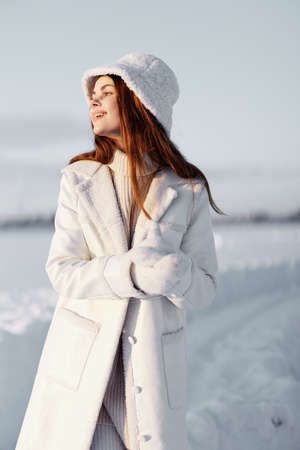 beautiful woman winter clothes walk snow cold vacation Fresh air