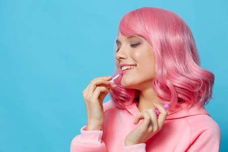 young woman with pink hair lipstick makeup Lifestyle fashion