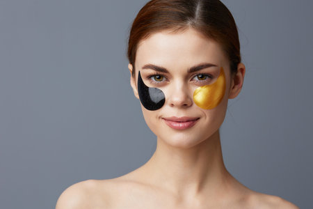 portrait woman multicolored patches rejuvenation skin care fun isolated backgroundの写真素材