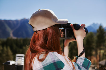 tourist with a camera on nature landscape mountains technologiesの写真素材