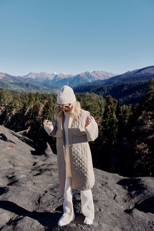 young woman nature autumn style travel to the mountains lifestyle