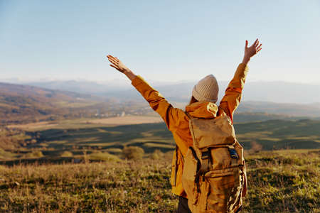 woman traveler admiring the landscape mountains nature relaxation
