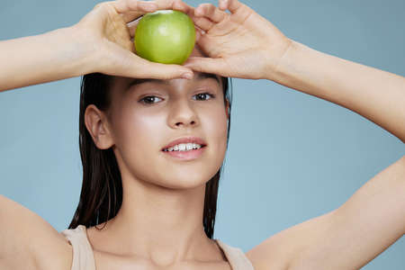 portrait woman in hands posing fruit healthy food fresh close-up Lifestyleの写真素材