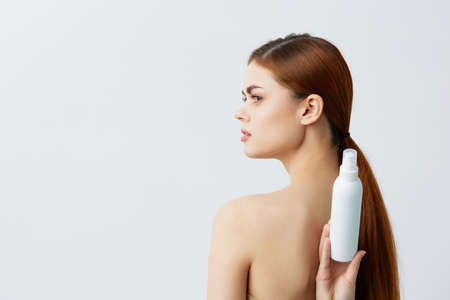 young woman body lotion rejuvenation cosmetics close-up Lifestyleの写真素材