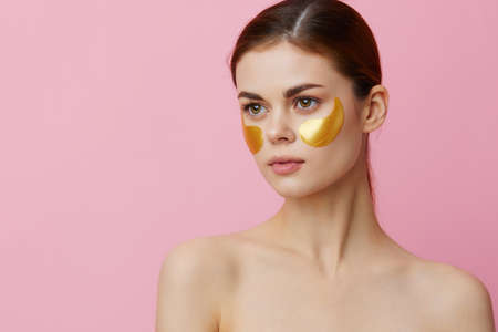 woman golden patches clean skin smile posing close-up Lifestyleの写真素材