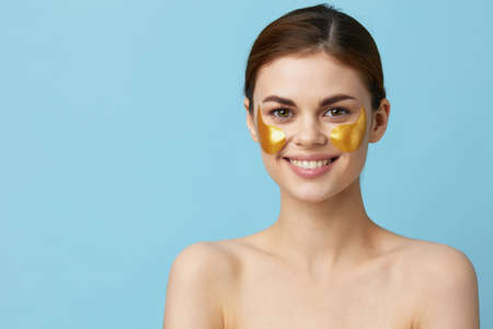 woman golden patches clean skin smile posing close-up Lifestyleの写真素材