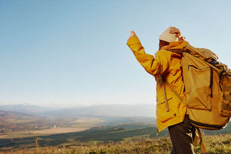 woman tourist admiring the landscape mountains nature relaxation. High quality photoの写真素材