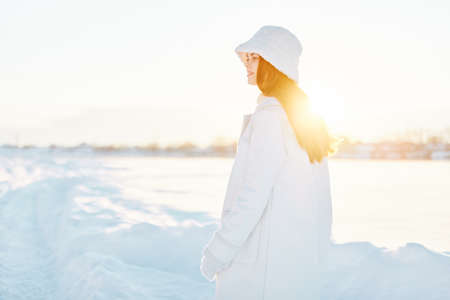 woman winter clothes walk snow cold vacation Lifestyleの写真素材