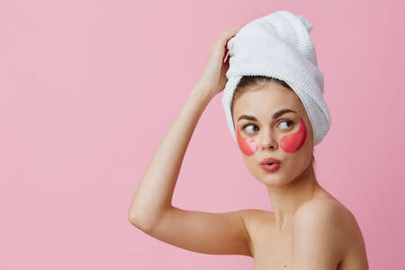 pretty woman pink patches clean skin smile posing close-up Lifestyleの写真素材