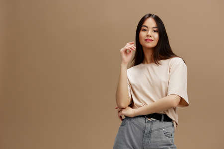 beautiful woman attractive look charmin in a t-shirt studio modelの写真素材