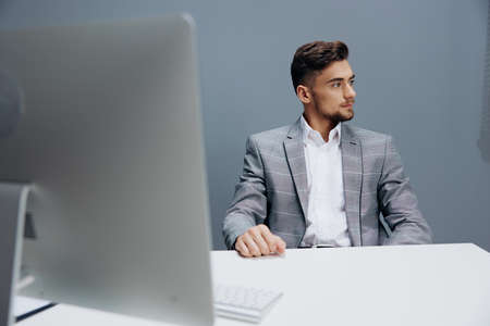 businessmen working at the computer in the office isolated background