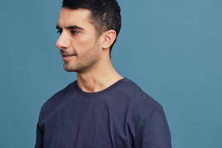portrait man in blue t-shirts posing emotions isolated background