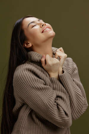 Brunette attractive look charm warm sweater isolated background