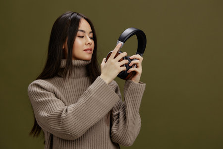 woman in headphones listening to music emotions Lifestyleの写真素材