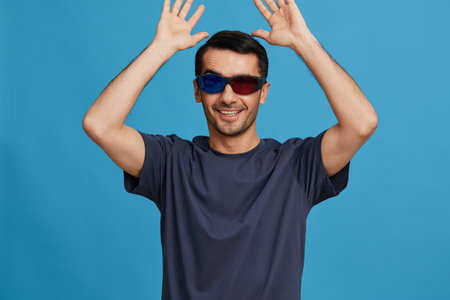 portrait man Cheerful man in cinema glasses in a t-shirt cropped view