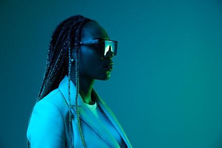 African american woman portrait business smile and fashion wearing glasses on blue background in...